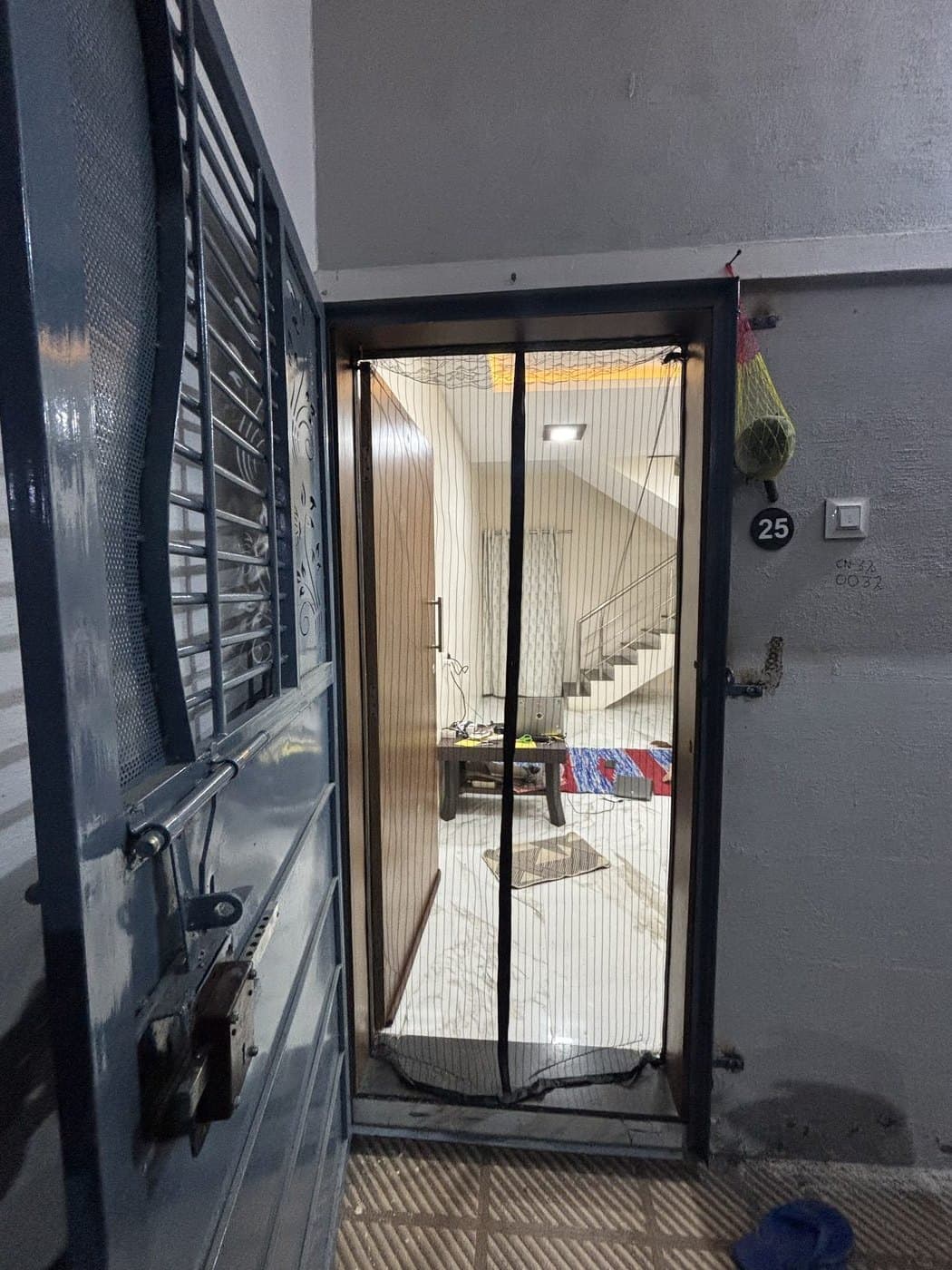 Mosquito door net installed — Iron grill